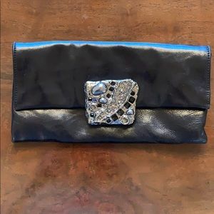 Black leather Prada clutch